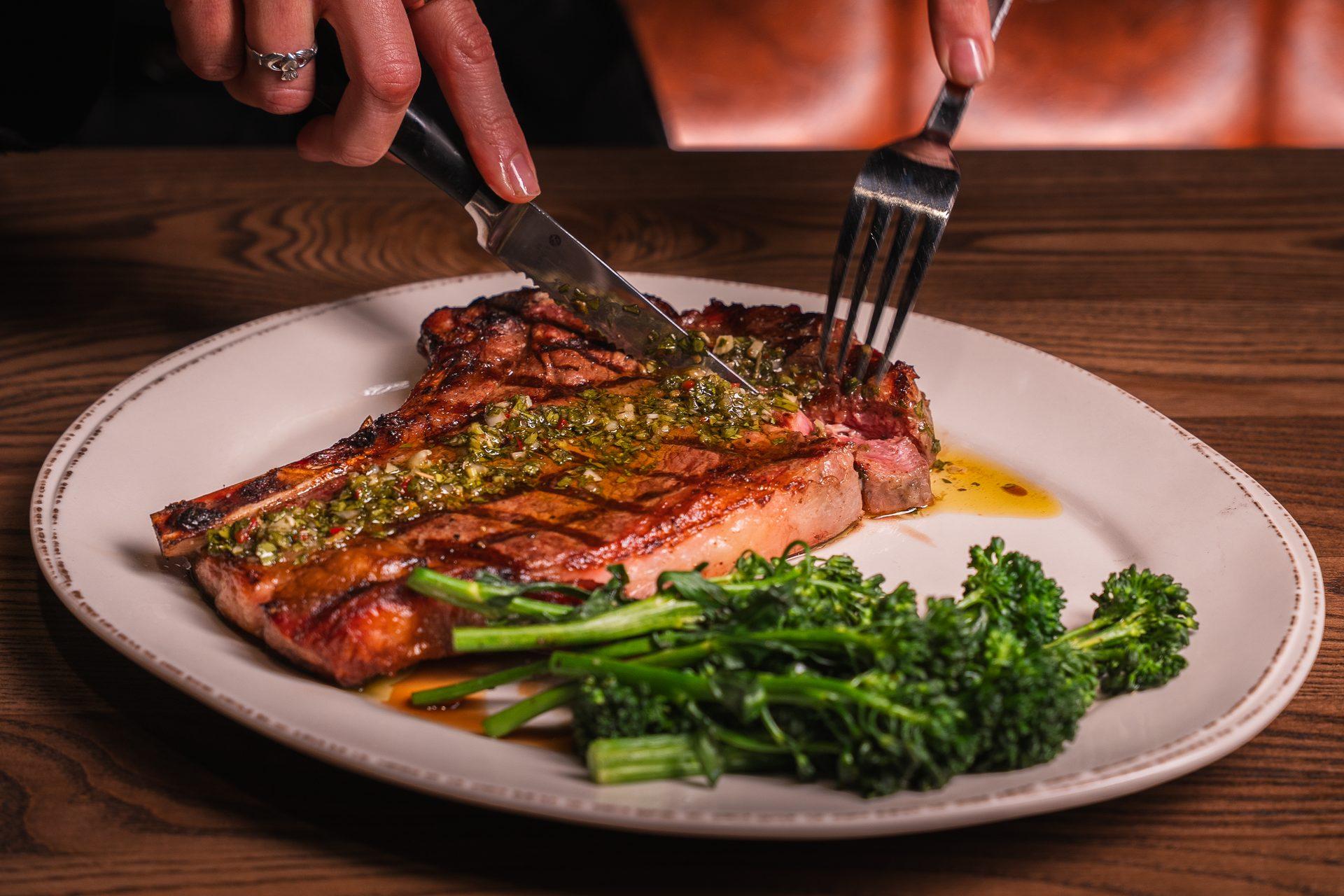 Prime bone-in steak with chimichurri